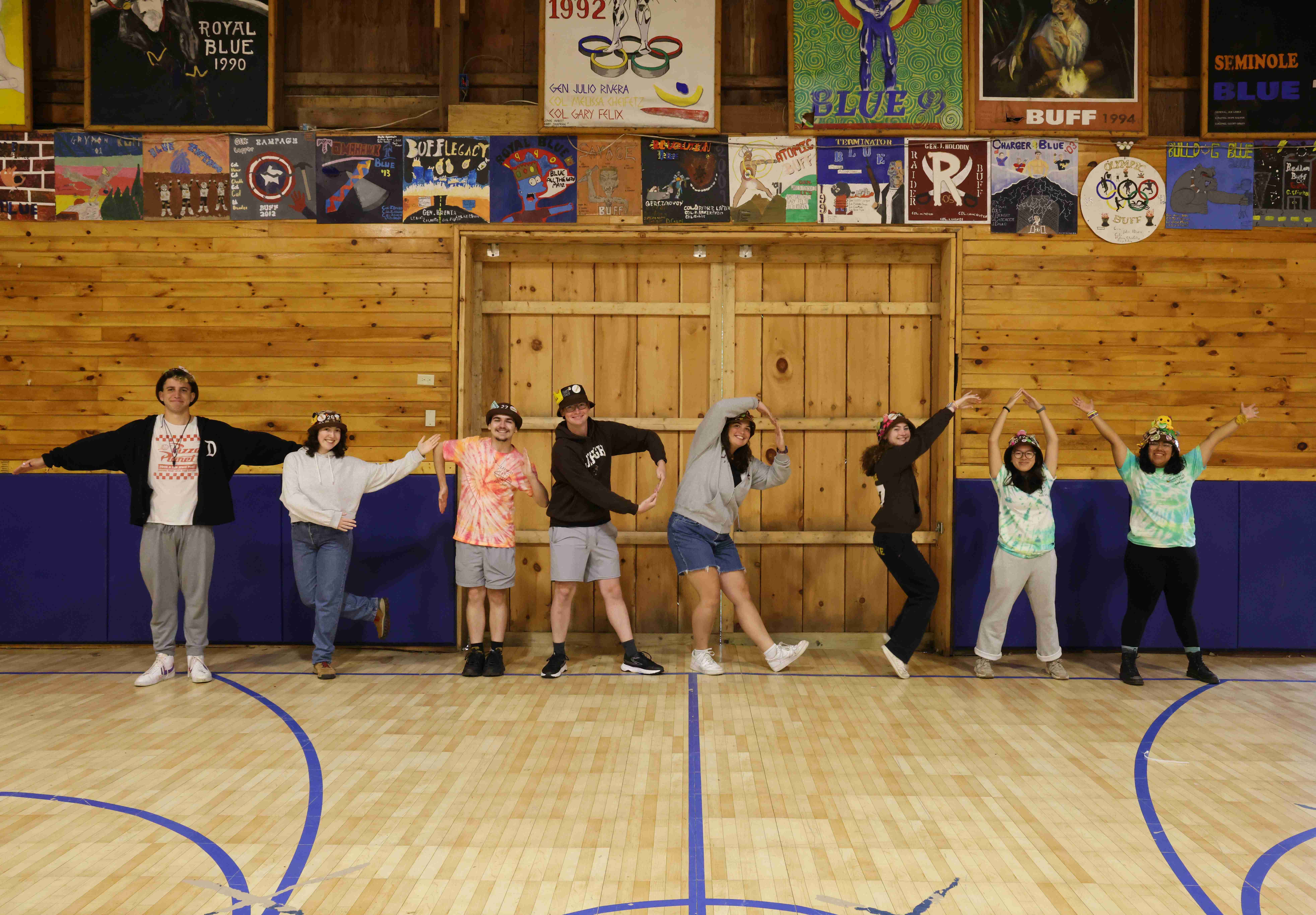 Rank 11 spelling out 'tenor sax' with their bodies, each one of them forming a letter.