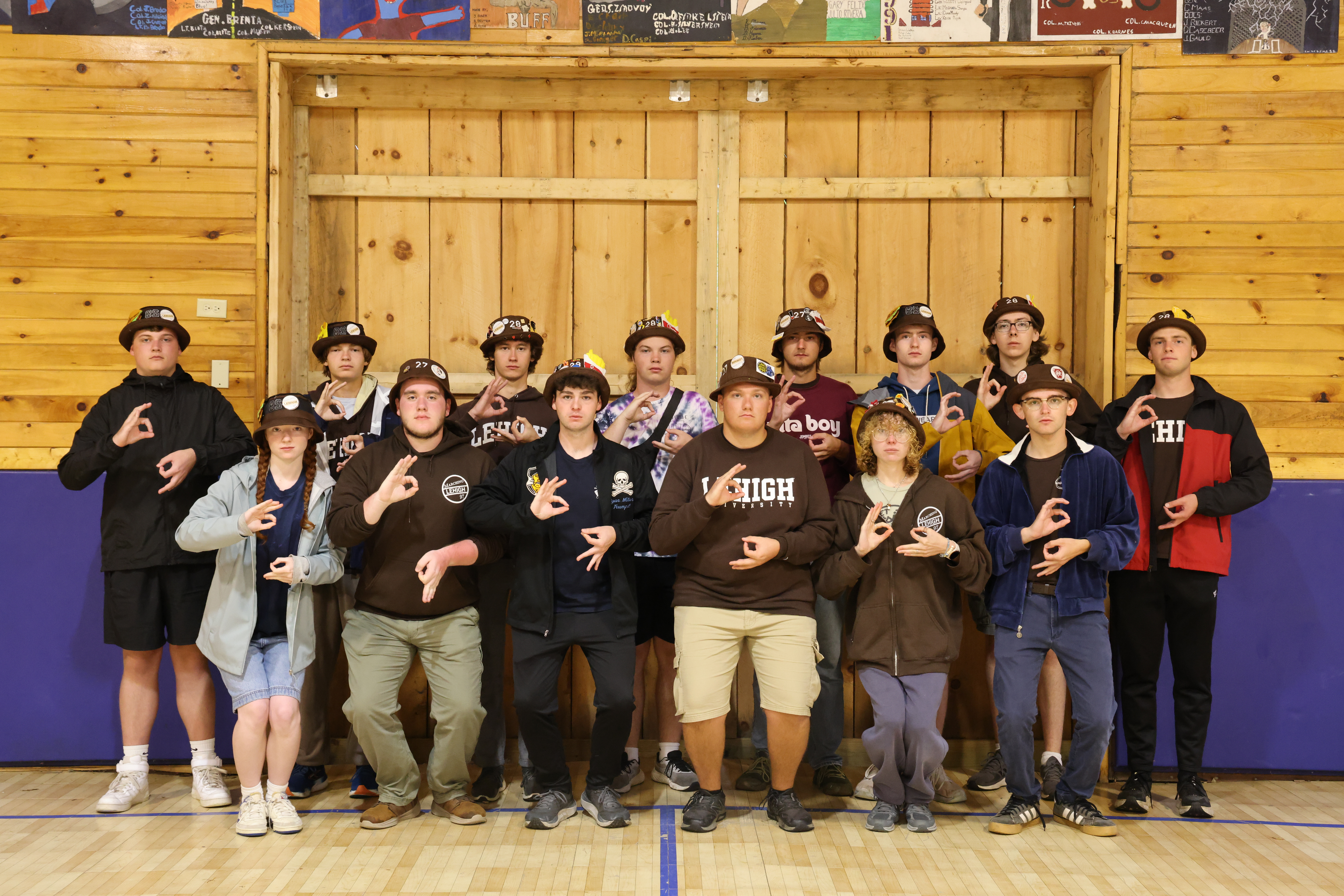 Ranks 6 and 9 in two rows with serious expressions, making a 6 and a 9 with each hand.
