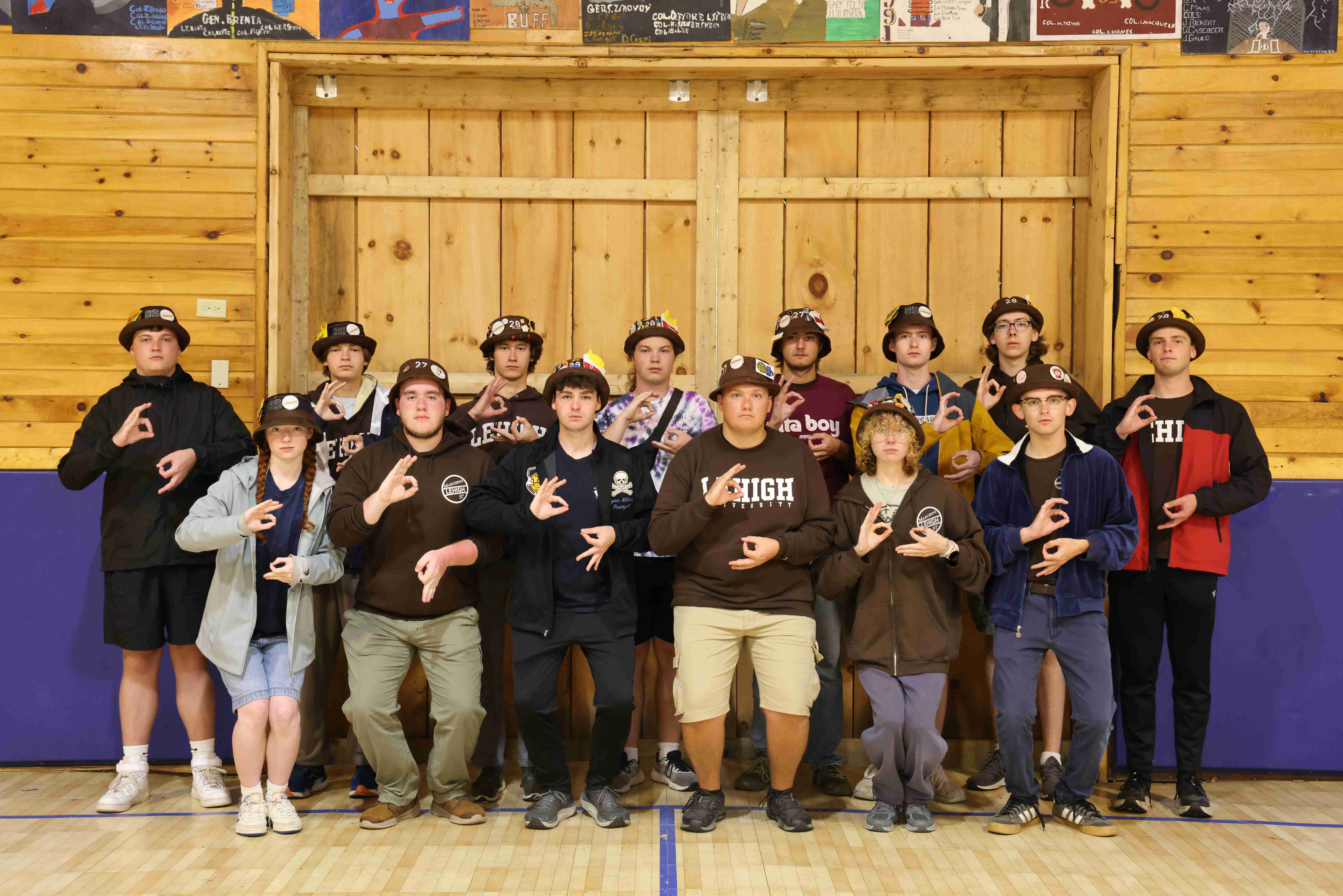 Ranks 6 and 9 in two rows with serious expressions, making a 6 and a 9 with each hand.